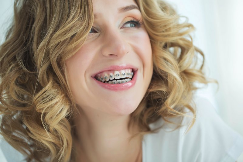 Lady with braces smiles